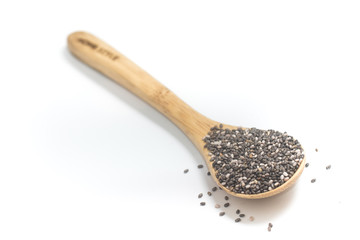 Chia seeds in a wooden spoon