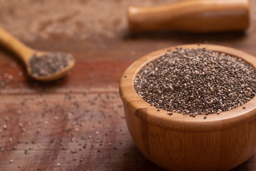 Chia seeds in a wooden bowl