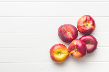 Ripe flat nectarines.