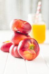 Ripe flat nectarines.