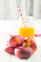 Ripe flat nectarines.