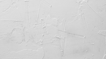 Texture of white plaster. Covering the concrete wall of the house. Rough surface. Repair and construction.