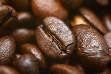 A lot of of different kinds of coffee beans. Coffee Background. Roasted coffee beans. Close up.