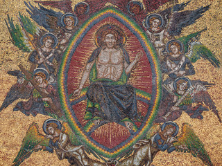 Jesus Surrounded with Angels Detail of the Mosaic of the Last Judgment at the Golden Gate of the Gothic Church Saint Vitus Cathedral in Prague, Bohemia, Czech Republic. A Famous Tourist Attraction.