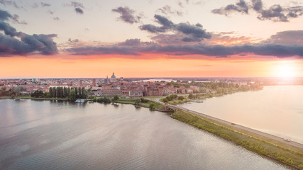 Aerial shot of UNESCO World Heritage site Mantua city at sunset