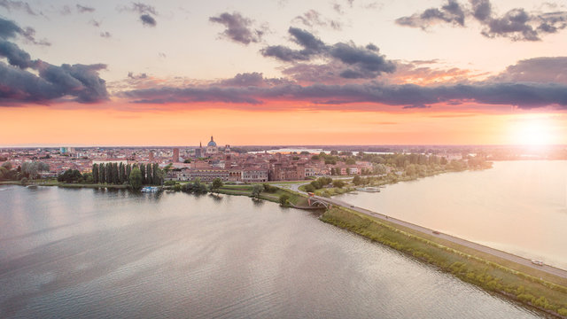 Aerial shot of UNESCO World Heritage site Mantua city at sunset