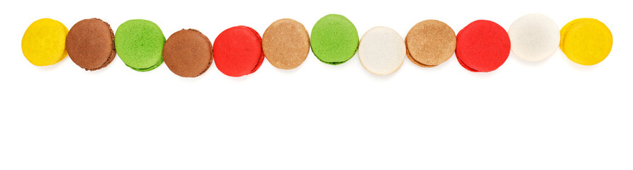 Banner of colored macarons on a white background. Sweet background of multi-colored biscuits.