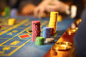 Chips close-up on the table in the casino.