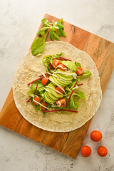 Wraps or torttila. Open avocado, vegan wraps. Healthy food. Copy space.