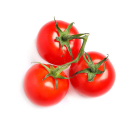 Branch of fresh cherry tomatoes isolated on white