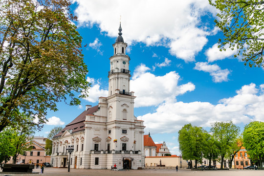 Town Hall White Swan in the center of Kaunas at the Town Hall Square in Lithuania in the spring against a blue sky with cirrus clouds
