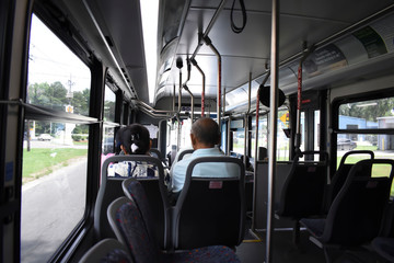 Fototapeta premium View of people riding the city bus, transit.
