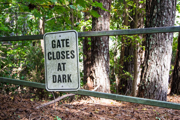 Fototapeta premium Sign notice on metal gate