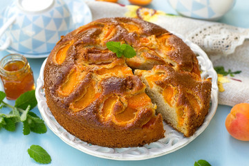 Sweet homemade cake with fresh apricots for tea