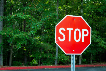 Red stop sign in green area