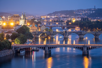 Fototapeta na wymiar Blue hour scene of Prague bridges under the lights