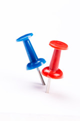 Push pins isolated on white background.