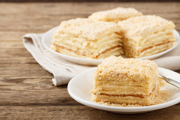 Cake Napoleon of puff pastry with sour cream. Close up.