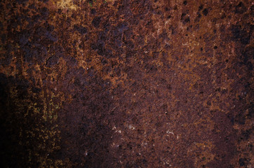 Rusted and oxidized metal texture. Background of the old ferrum sheet. Grunge wall with streaks of pitting. Concept of abstract corroded iron. Place for text