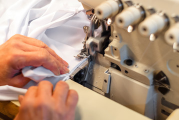 industrial overlock sewing machine in work