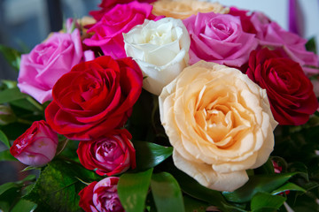 Beautiful wedding colorfull bouquet for bride. Beauty of colored flowers. Background . Beautiful bunch of Gerbera flowers with white, red, pink and yellow flowers .