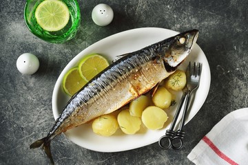 Delicious baked mackerel with dill, onion and lime. Healthy food.