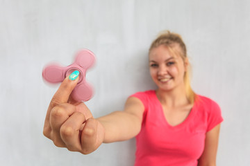 Woman playing fidget spinner
