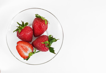 Delicious strawberry ice cream scoop with fresh strawberries on wooden background