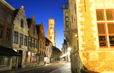 Belfry of Bruges and night street Bruges, Flemish Region, Belgium