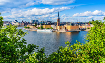 Gamla Stan old town in Stockholm Sweden on Lake Malaren waterfront seen from Monteliusvagen hill