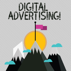 Text sign showing Digital Advertising. Business photo text marketing of products or services using internet Three High Mountains with Snow and One has Blank Colorful Flag at the Peak