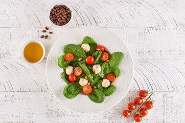healthy salad on a wooden white background