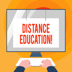 Word writing text Distance Education. Business photo showcasing learning remotely without being present at school Hands on Mockup Keyboard Front of Blank White Monitor with Screen Protector