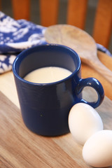 milk and eggs in a kitchen 