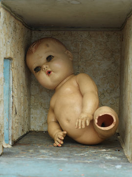 Broken Antique Doll