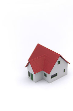A red tile house isolated on a white background image