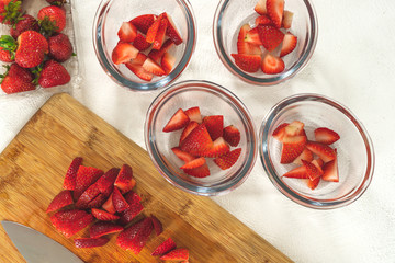 Sliced Strawberries in Clear Glass Bowls, Sliced Strawberries on a Chopping Board, Fruit Salad, Dessert