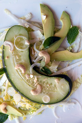 Cucumber salad with avocados and cashews