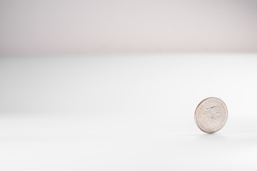 Currency rotating on white background, concept of American economy.