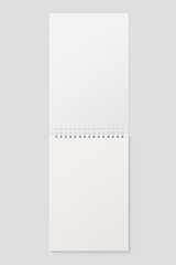 Blank realistic spiral bound notepad mockup on light grey background. High resolution. 