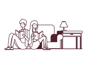 Fototapeta premium silhouette of couple with book in hands in living room
