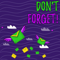Text sign showing Don T Forget. Business photo showcasing used to remind someone about important fact or detail Many Colorful Airmail Flying Letter Envelopes and Two of Them with Wings