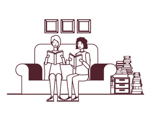 silhouette of couple with book in hands in living room