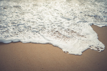 Tropical nature clean beach and white sand in summer with sun light blue sky and bokeh background.