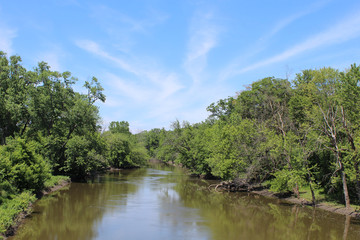 Fototapeta na wymiar Cirrus clouds over the Des Plaines River at Campground Road Woods