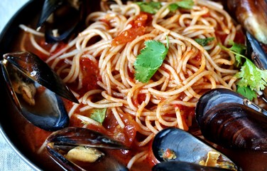 Pasta Spaghetti with mussels, tomato sauce. sea food meal. Mussels Marinara. Typical dish of Italian pasta.