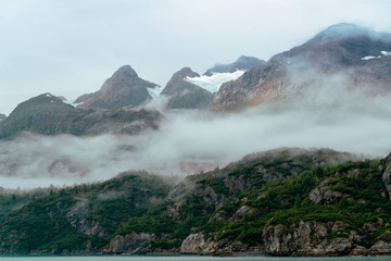 A mountain rising above the fog