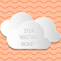 Writing note showing Stop Wasting Money. Business concept for advicing demonstrating or group to start saving and use it wisely White Clouds Cut Out of Board Floating on Top of Each Other
