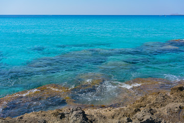 Azure waters of Mediterranean Sea near mountainous Crete island, Greece.