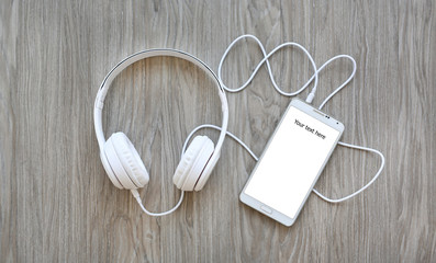 Headphones and smartphone with word 